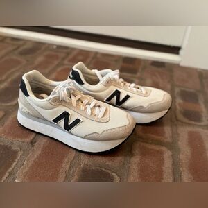 New Balance Cream and Black Athletic Shoes